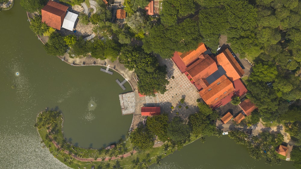 a bird's - eye view of a house in the middle of a lake