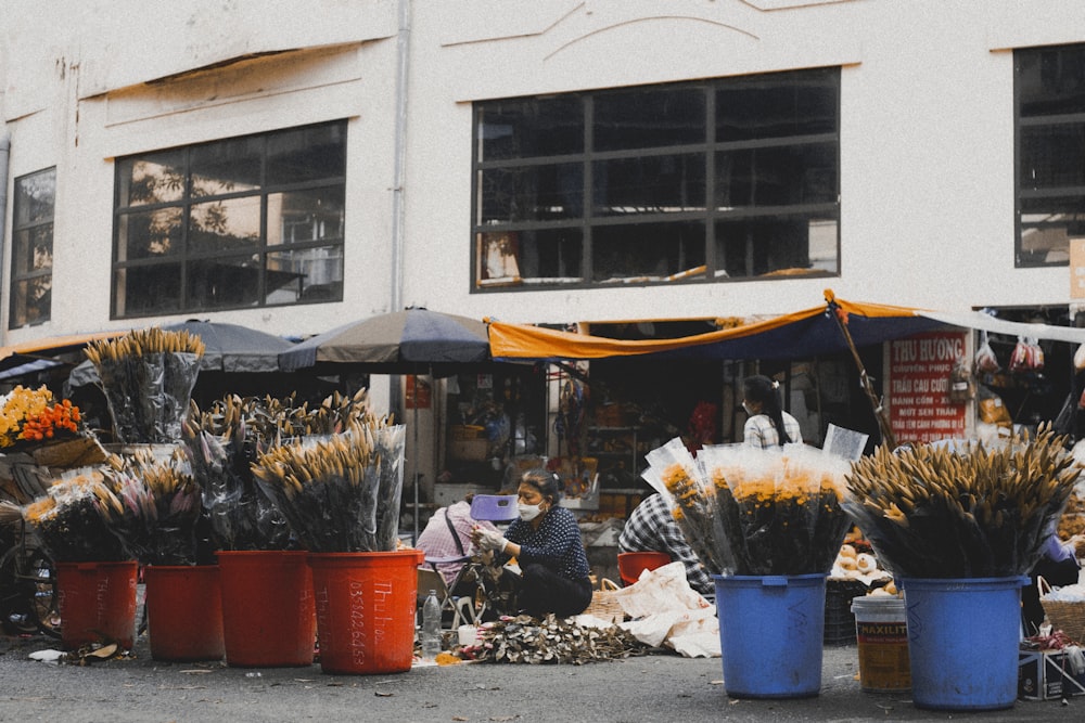 a bunch of buckets that are sitting in the street