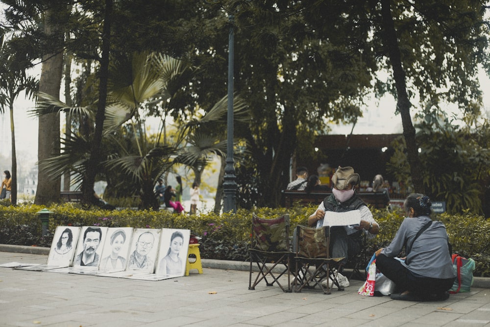 a man sitting on a bench next to a woman