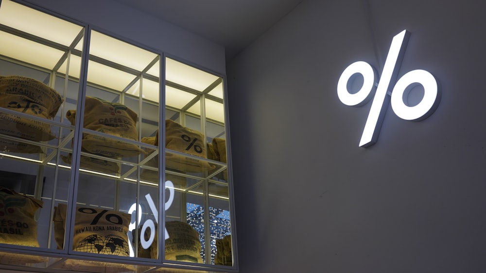 a store window with a sign that reads 70 %