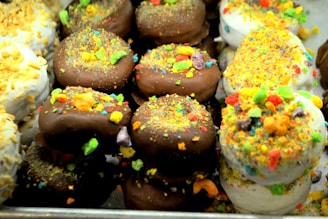 A vibrant selection of fruity flavored mini donuts.