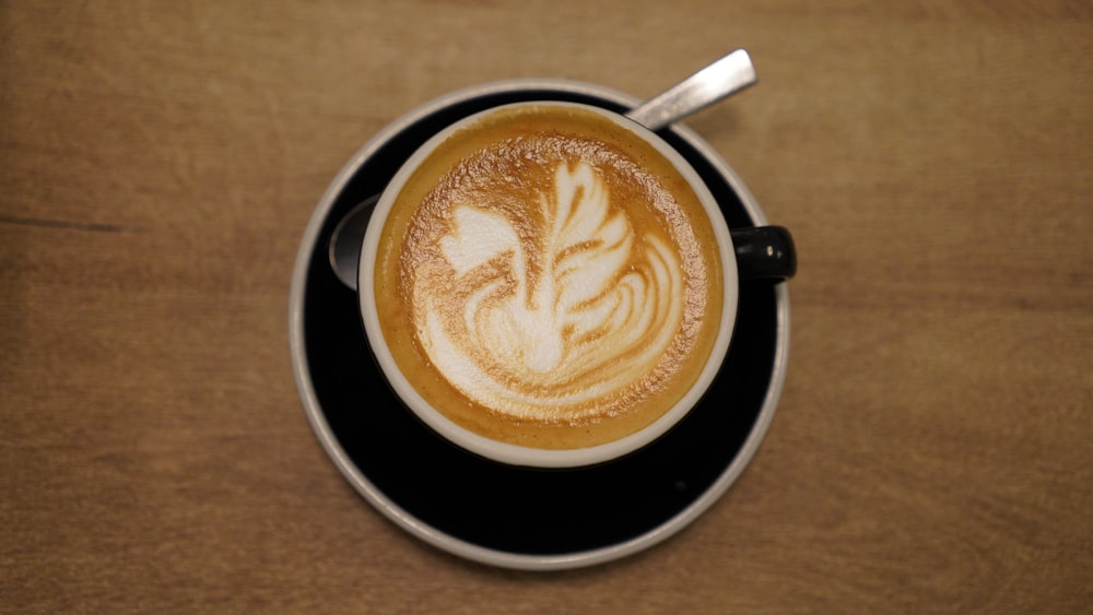 a cup of cappuccino on a saucer