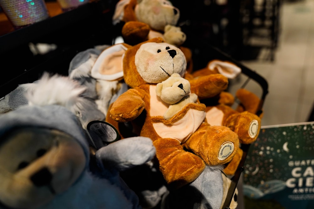 a group of stuffed animals sitting next to each other