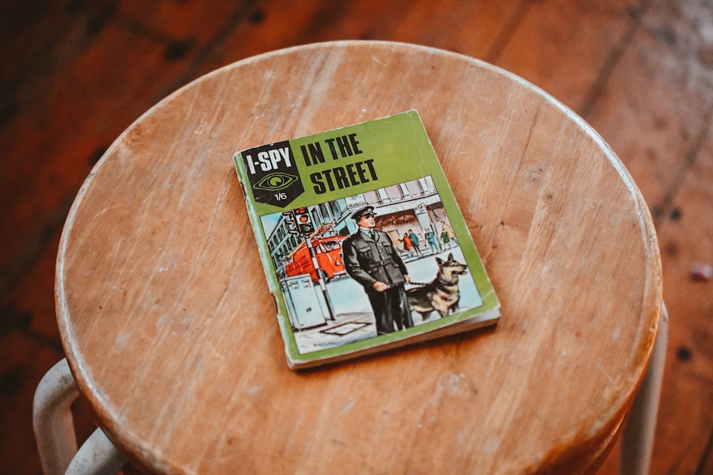 a book sitting on top of a wooden table