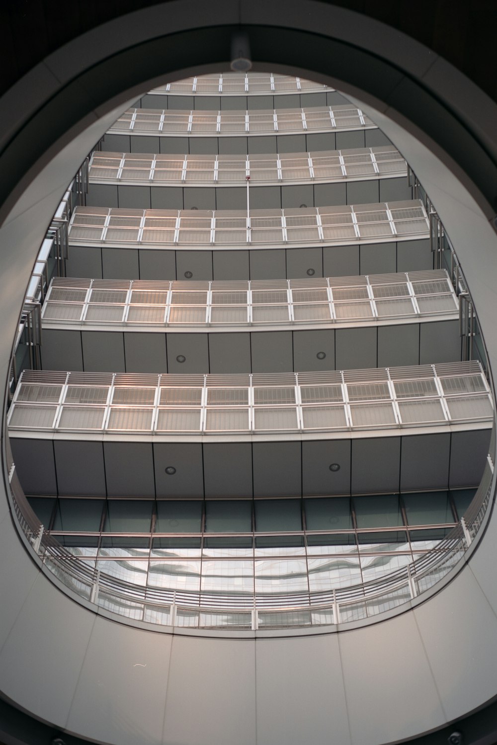 a set of stairs in a building with a skylight