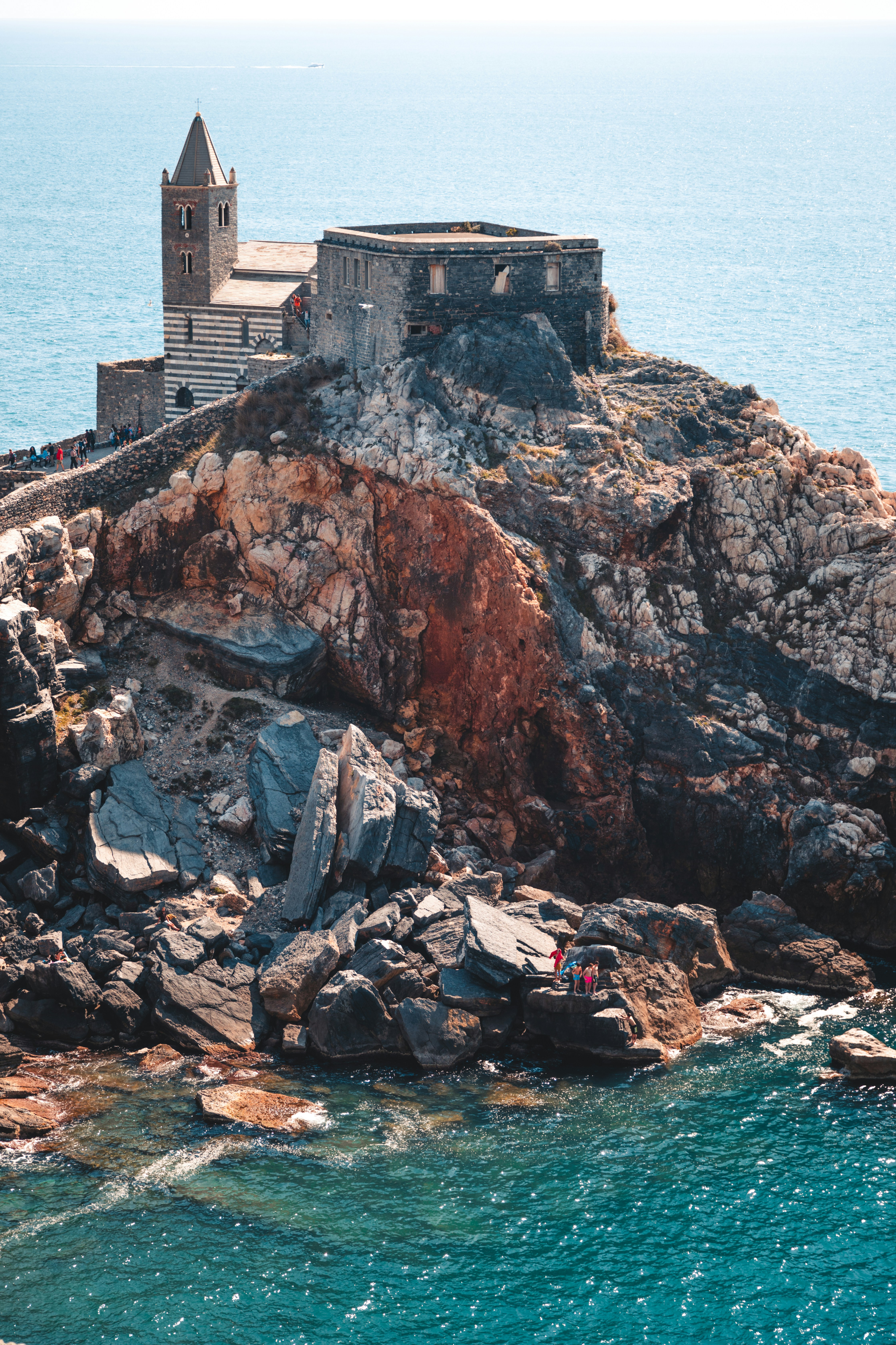 A small island with a church on top of it photo – Free Building Image on  Unsplash, image size:3000x4500