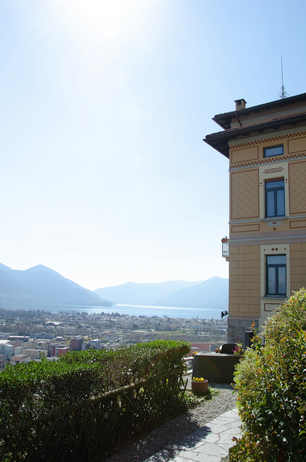 a house with a view of a lake and mountains