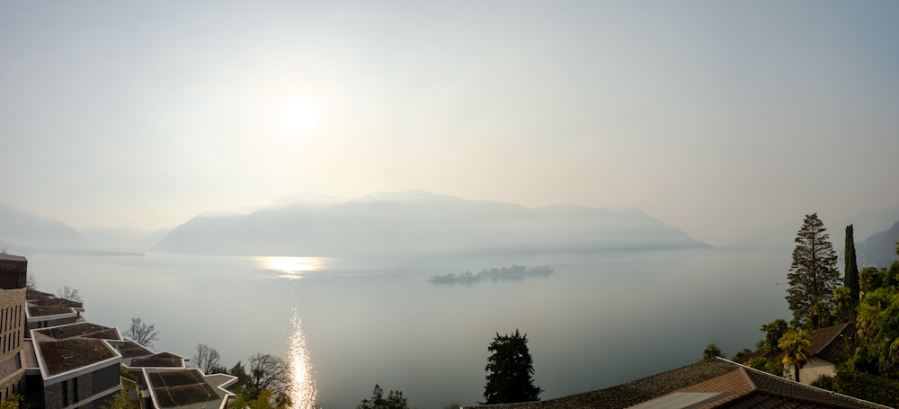 a view of a body of water with mountains in the background