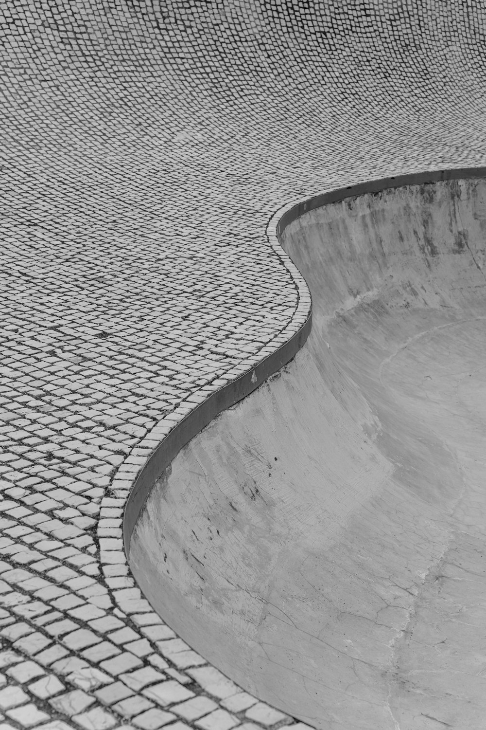 a man riding a skateboard up the side of a ramp