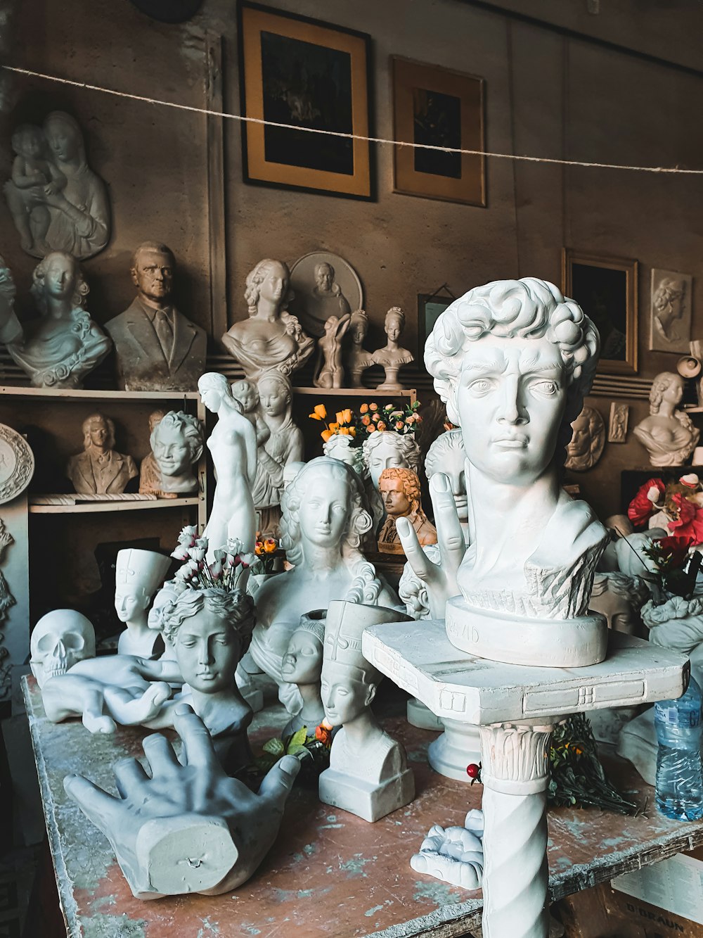 a bunch of statues that are on a table
