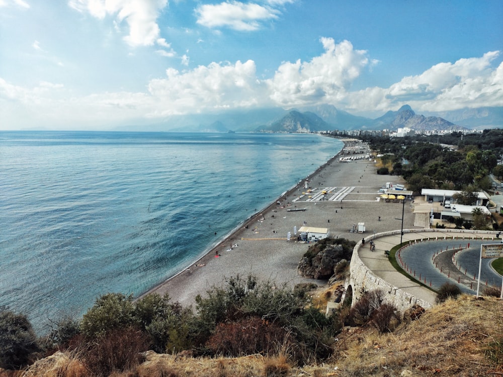 a large body of water next to a beach