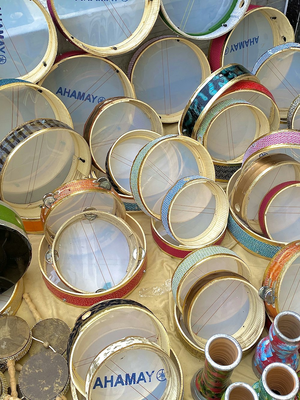 a table topped with lots of different types of bangles