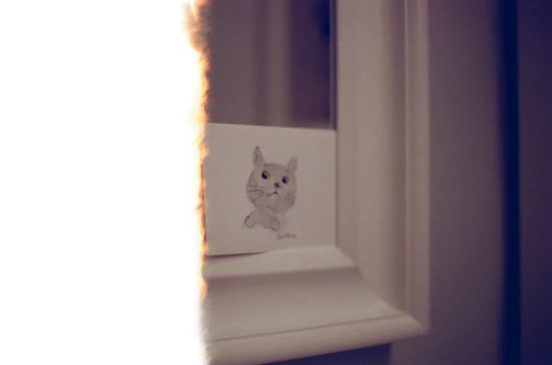 Cozy drawing of playful cats in fluffy pillows with soft shadows