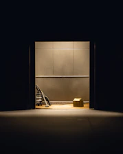A sleek, modern vacuum cleaner shining under soft lighting on a clean floor
