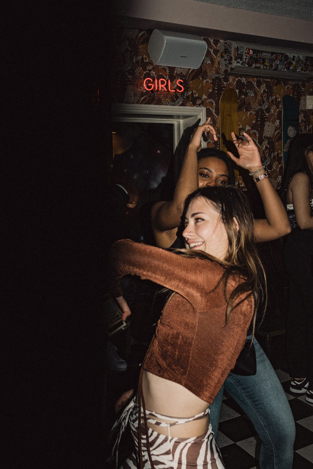 a group of people dancing at a party