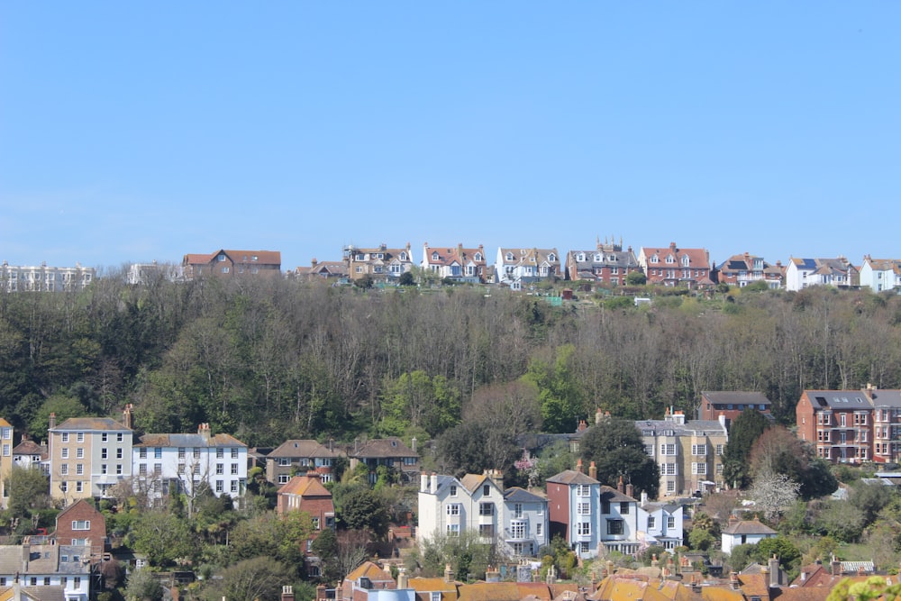 a city with lots of houses on a hill