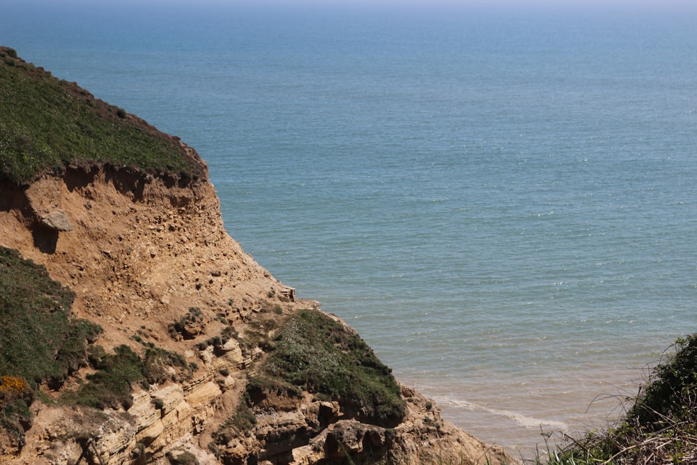 a view of the ocean from a cliff