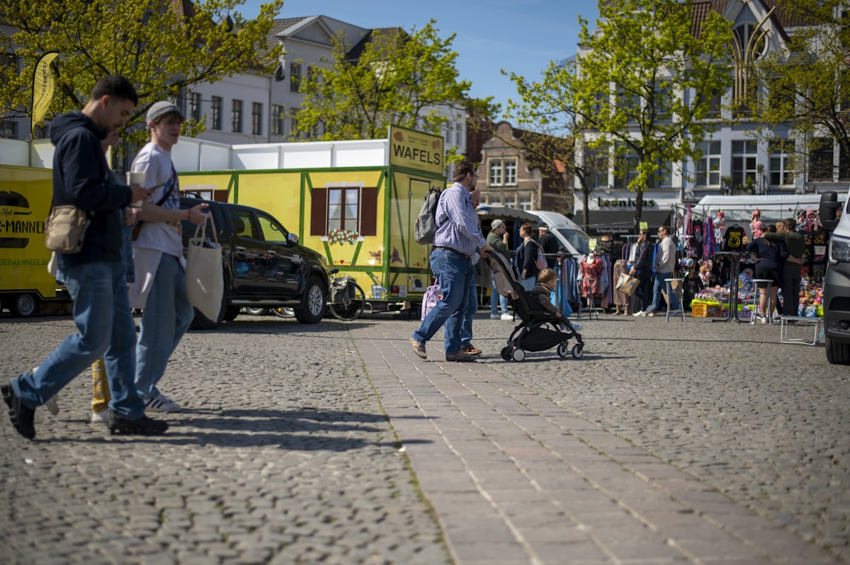 People walking through the streets of Ghent during the Ghent Festivities