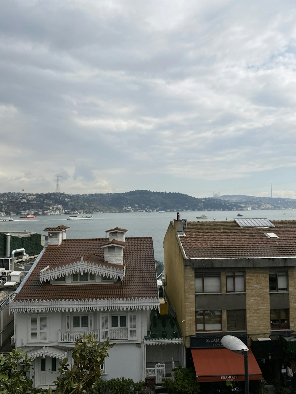 a view of a body of water from a rooftop