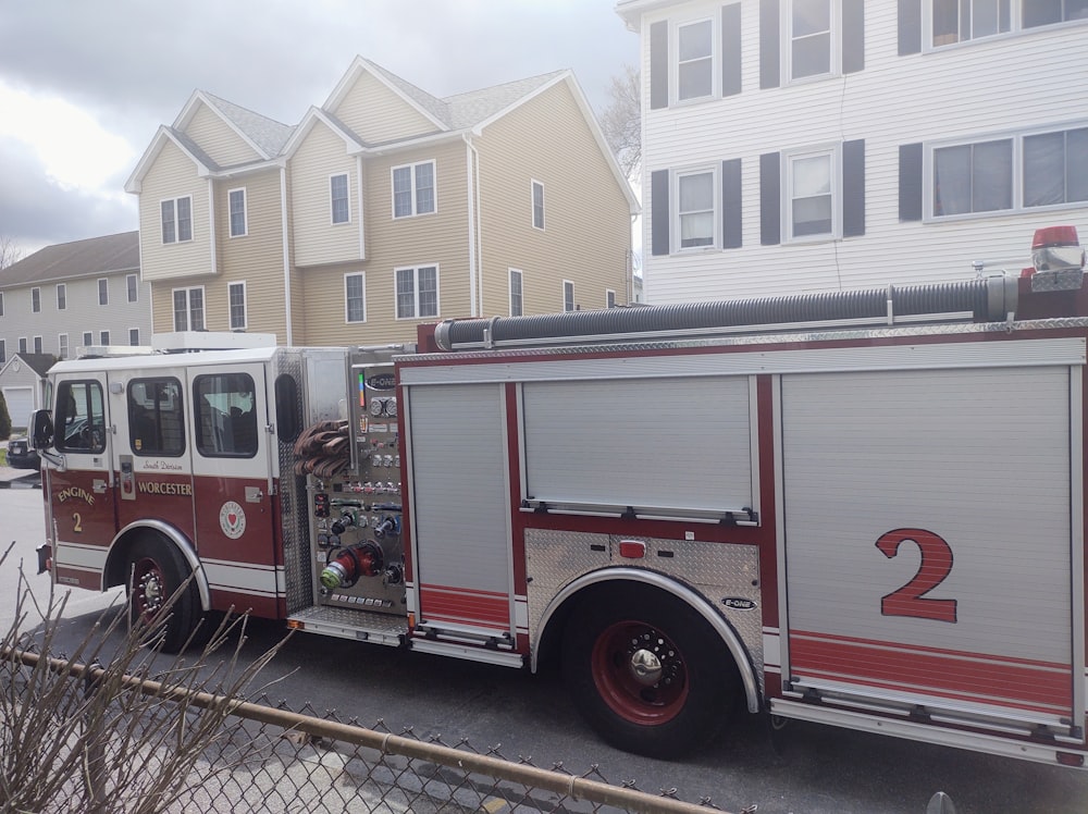 a fire truck parked in front of a house