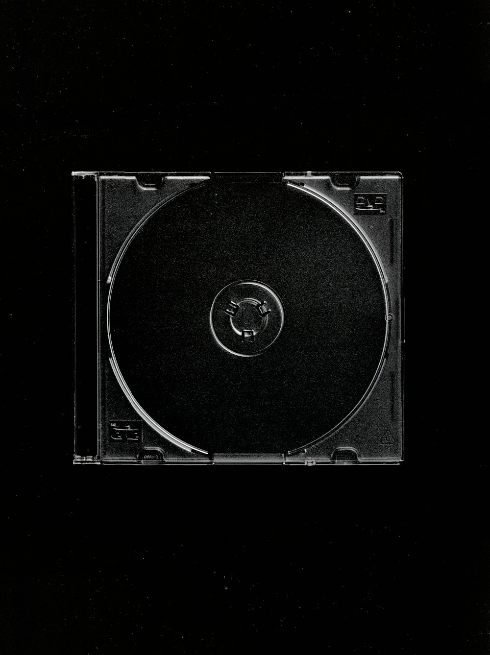 a black and white photo of a cd case