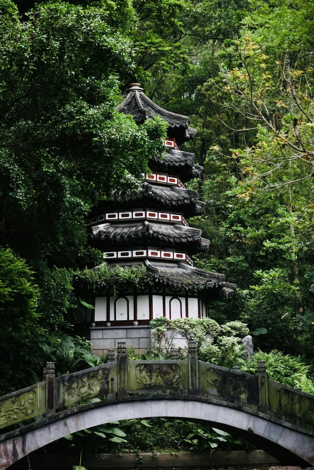 a bridge that has a building on top of it