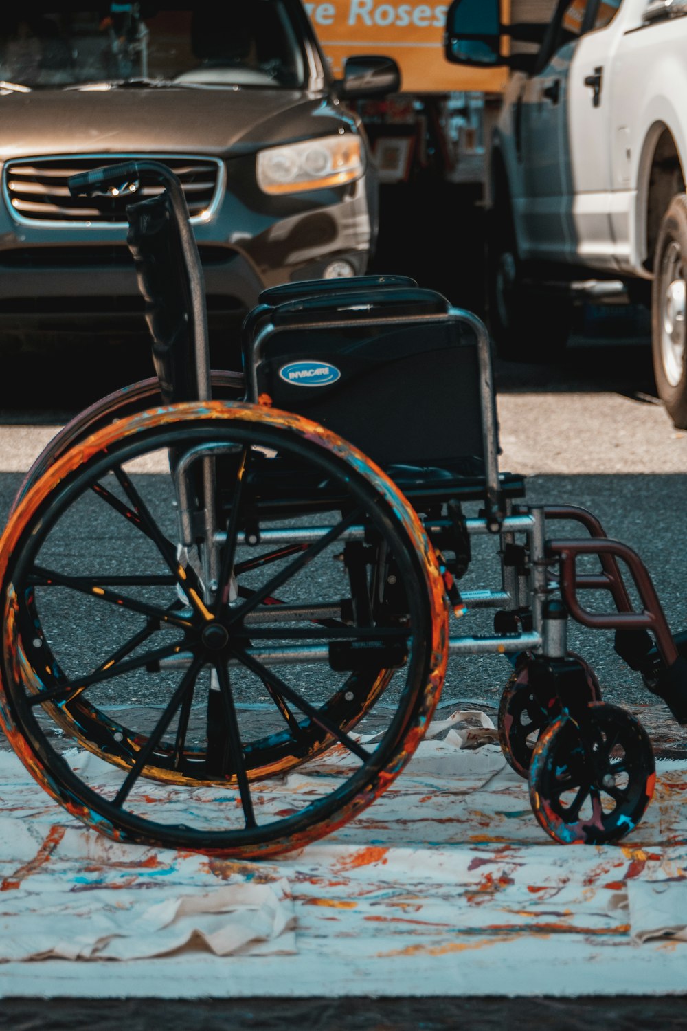 a wheel chair sitting on the side of a road