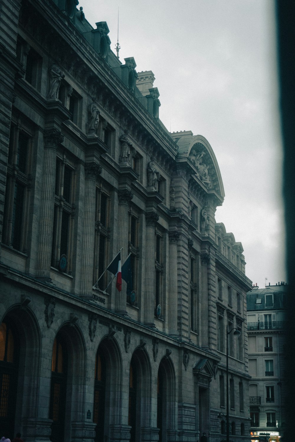 a large building with a flag on top of it