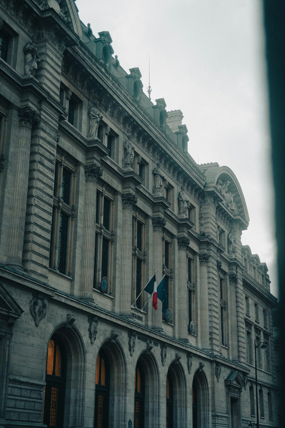 a large building with a flag on top of it