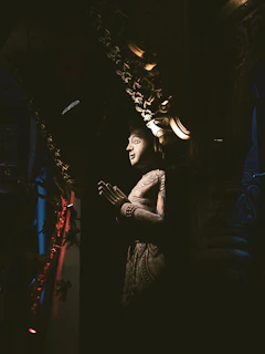 A handcrafted GK statue with fine textures and lifelike paintwork, set against a dark background