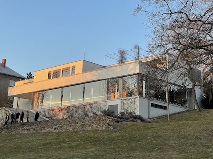 a group of people standing outside of a building