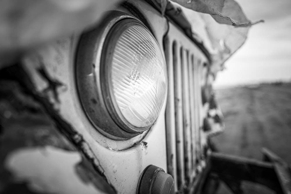 a close up of the front of an old truck