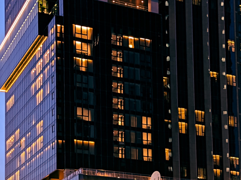 a very tall building lit up at night