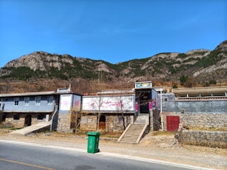 a street with a mountain in the background