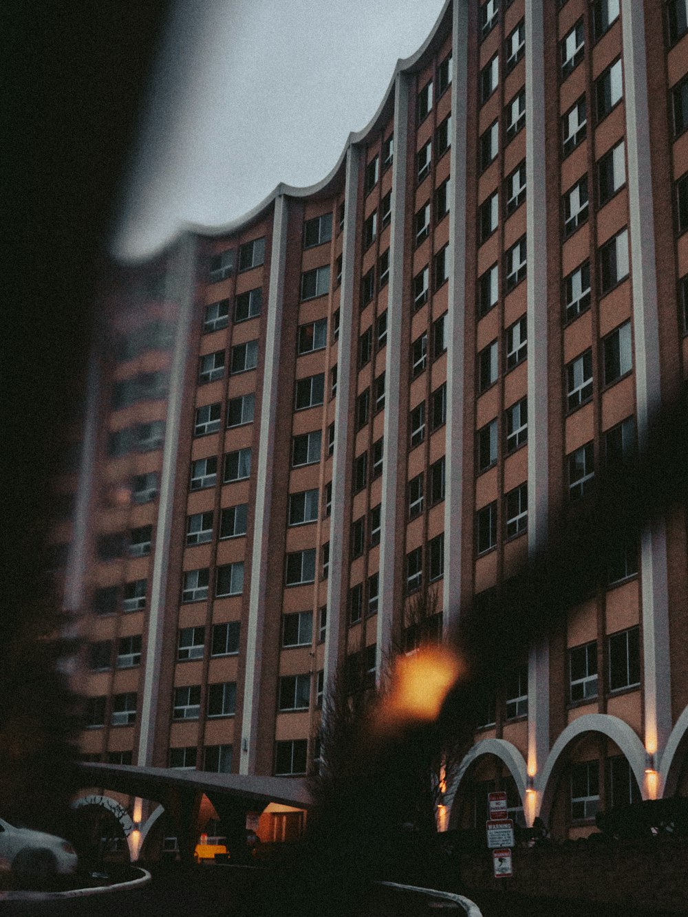 a tall building with a clock on the side of it