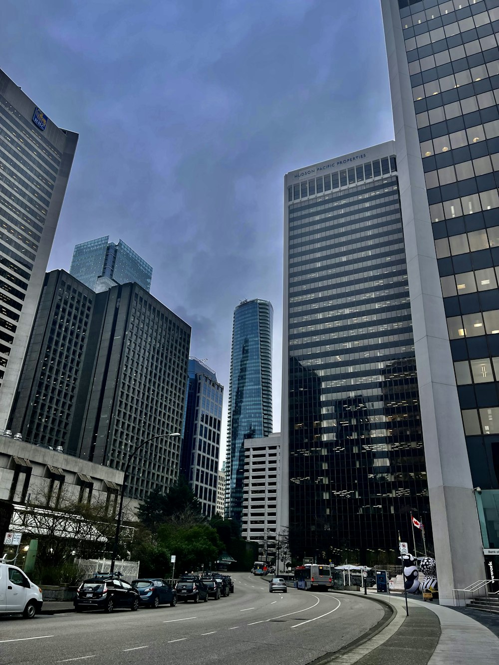 a city street filled with lots of tall buildings