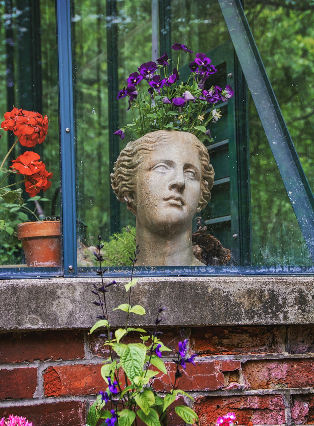 a statue of a woman with flowers in her hair