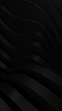 an abstract black background with wavy lines