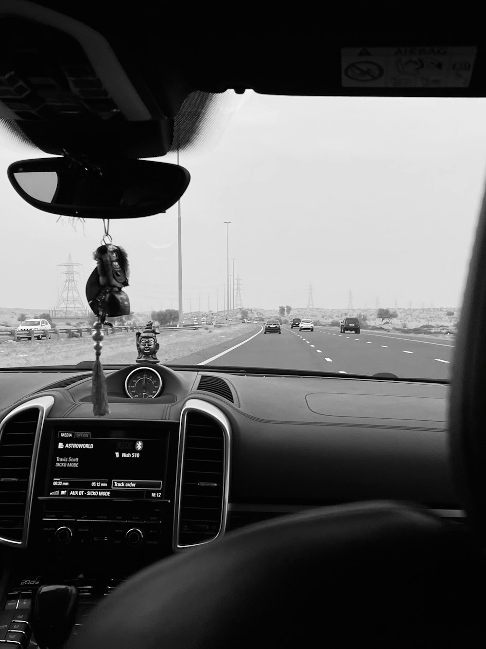 a view of a highway from inside a car