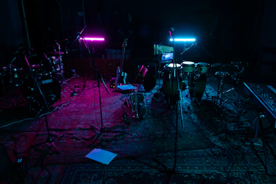 A vibrant studio setup with musical instruments and recording equipment, capturing the creative vibe of the ustike música channel.