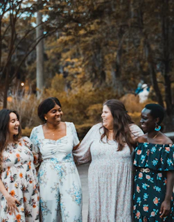a group of women standing next to each other