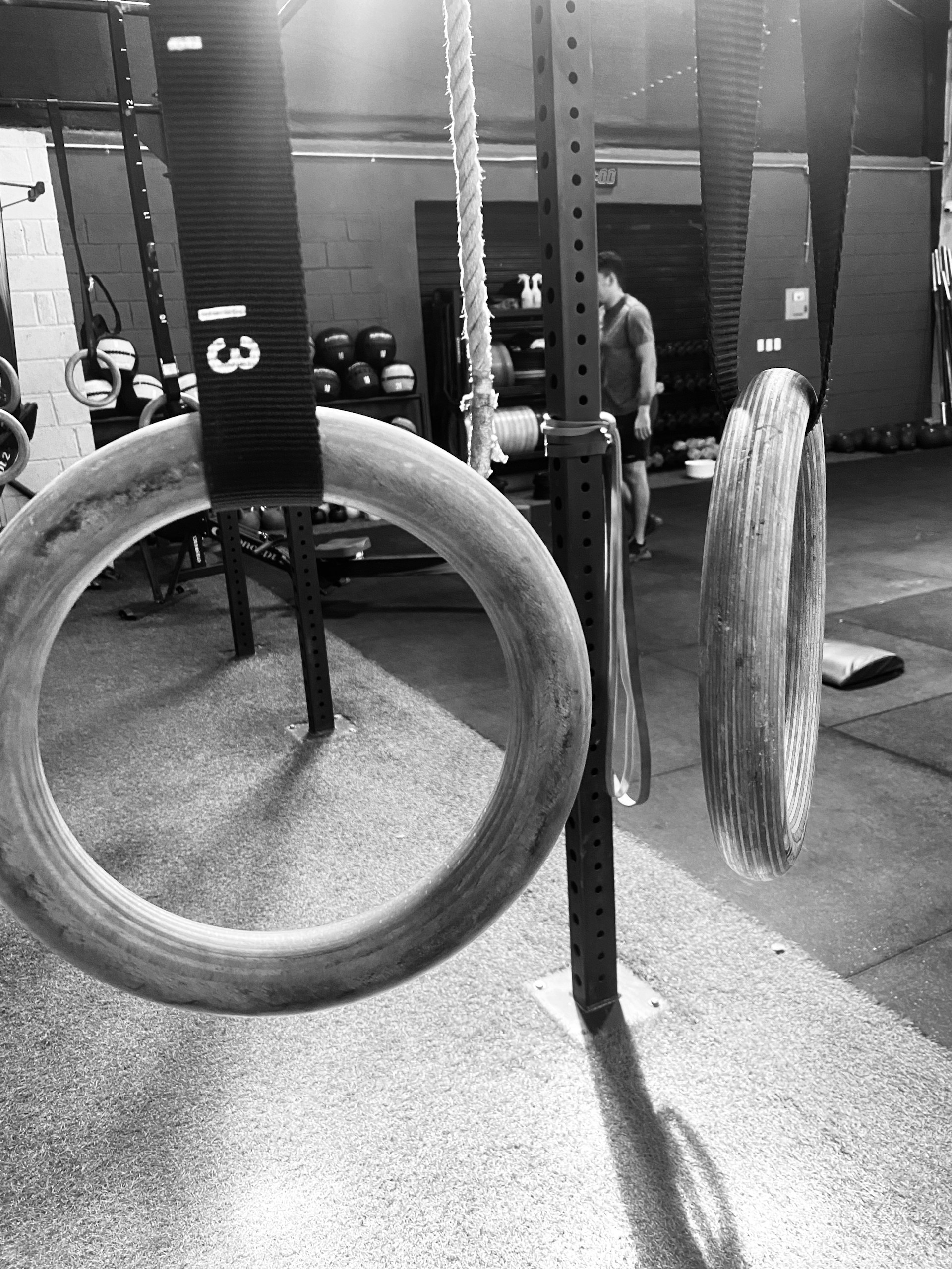 a gym filled with lots of different types of exercise equipment