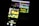 A blurred image showing a laptop screen with various programming-related words such as 'Node', 'JavaScript', 'Redis', and 'SQL'. The text appears in different colors and sizes, overlaid on the screen.