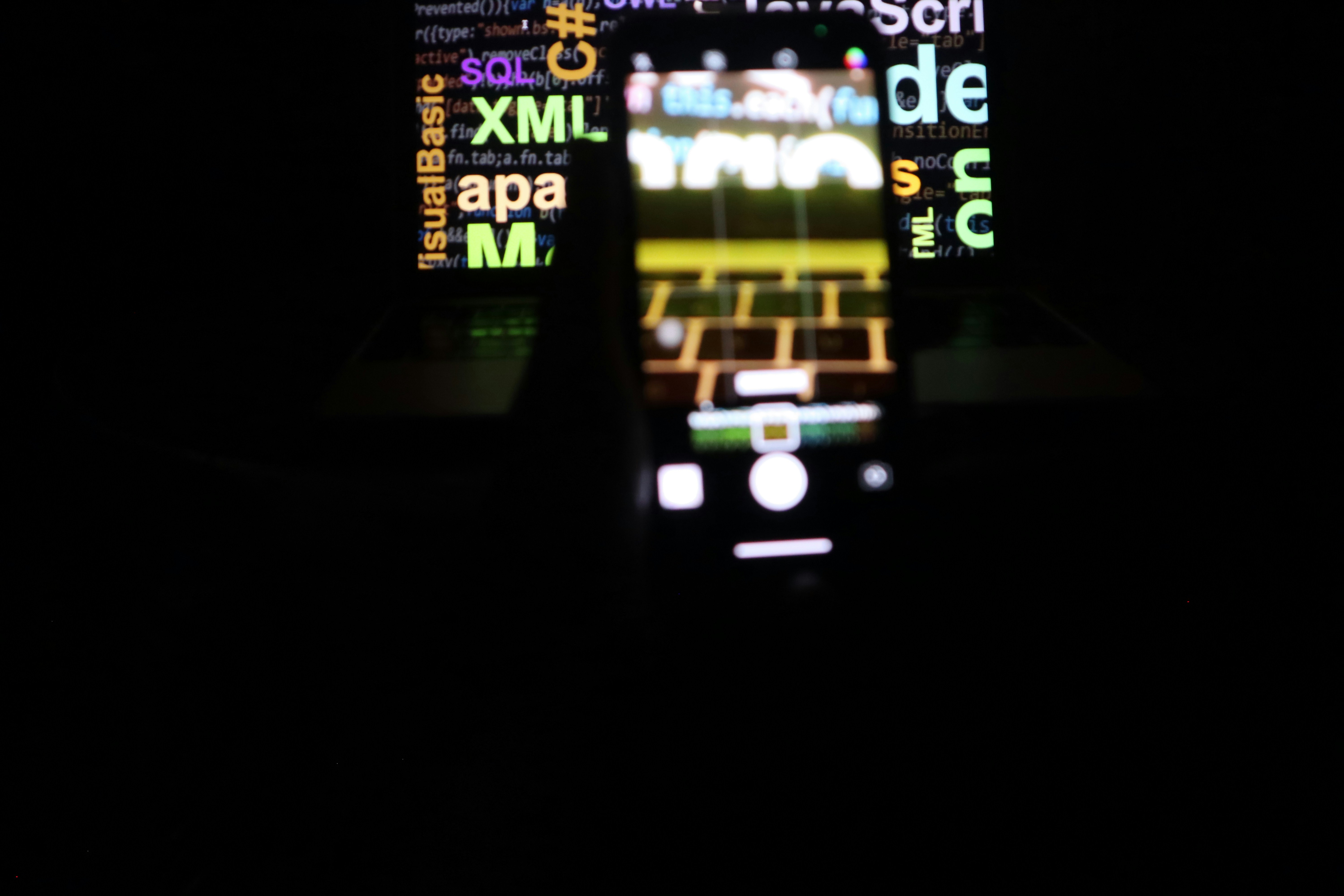 a cell phone is lit up in the dark