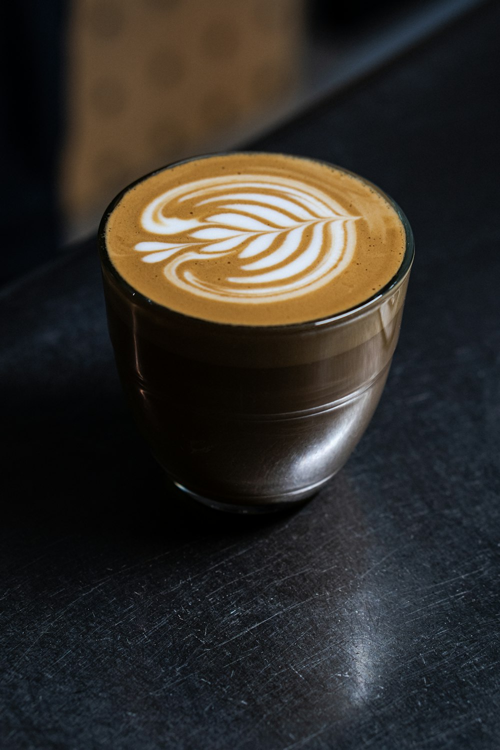 a cappuccino with a swirl in the foam