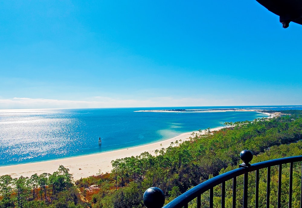 a view of a beach from a balcony