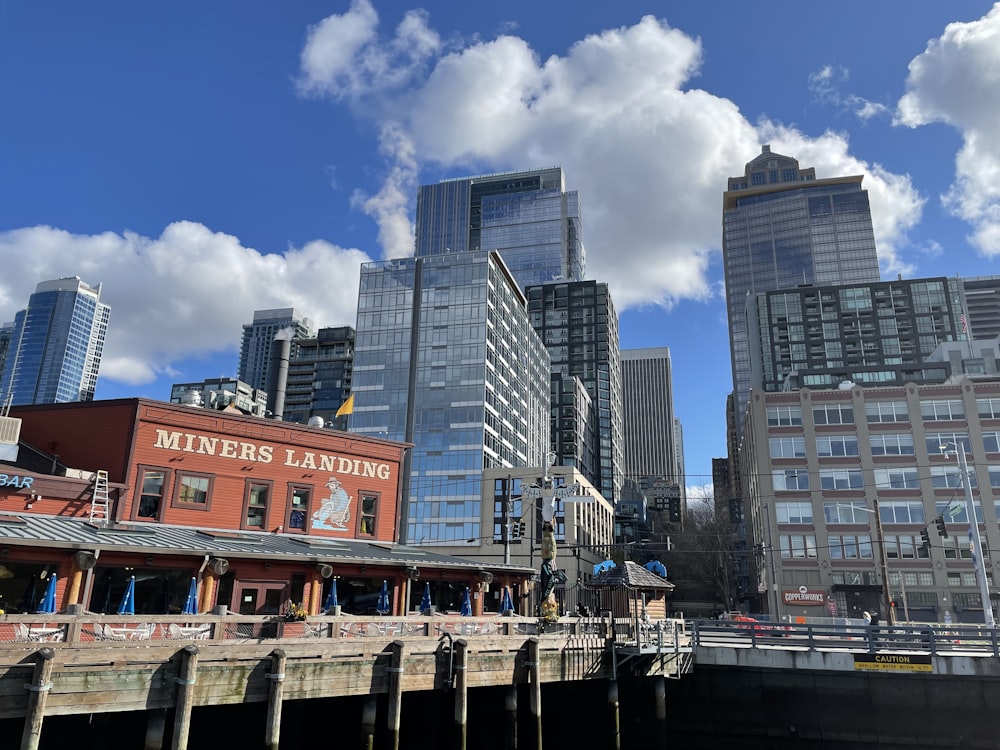 a group of buildings that are next to a body of water