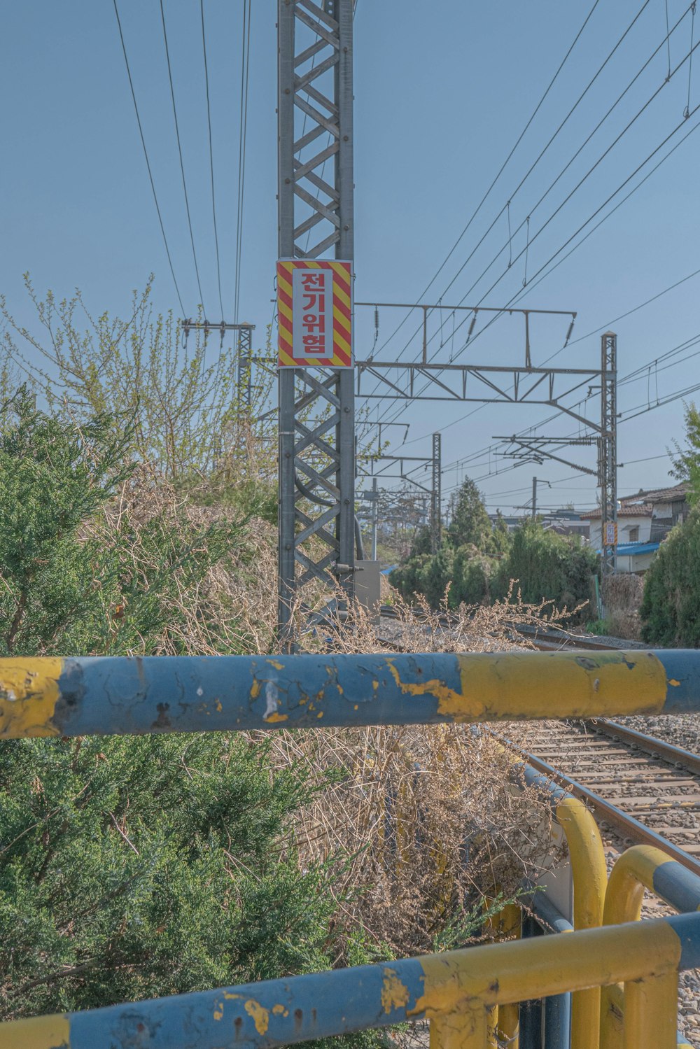 a train track with a sign on it