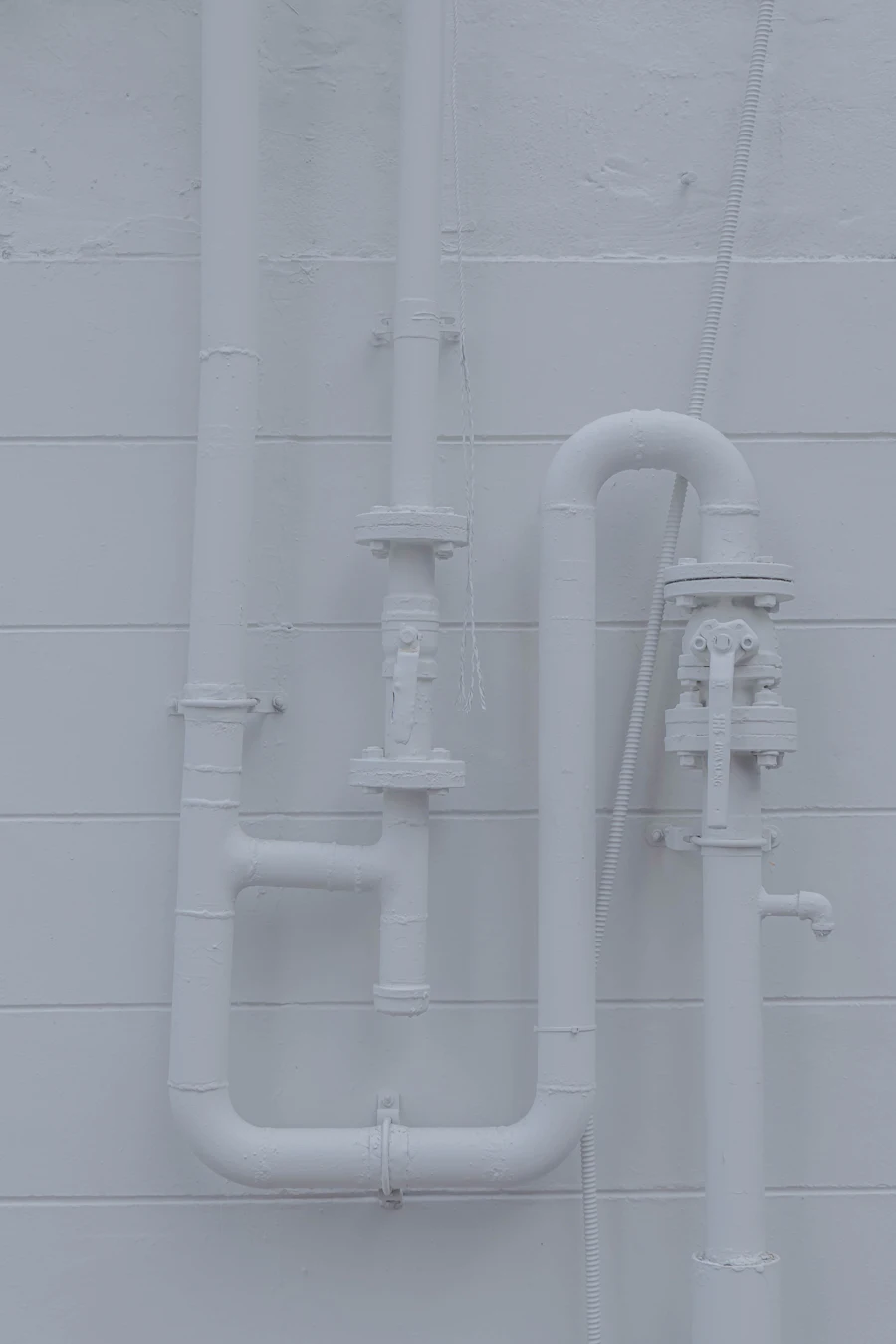 uPVC plumbing pipes SCH 40 and SCH 80 fixed along a wall