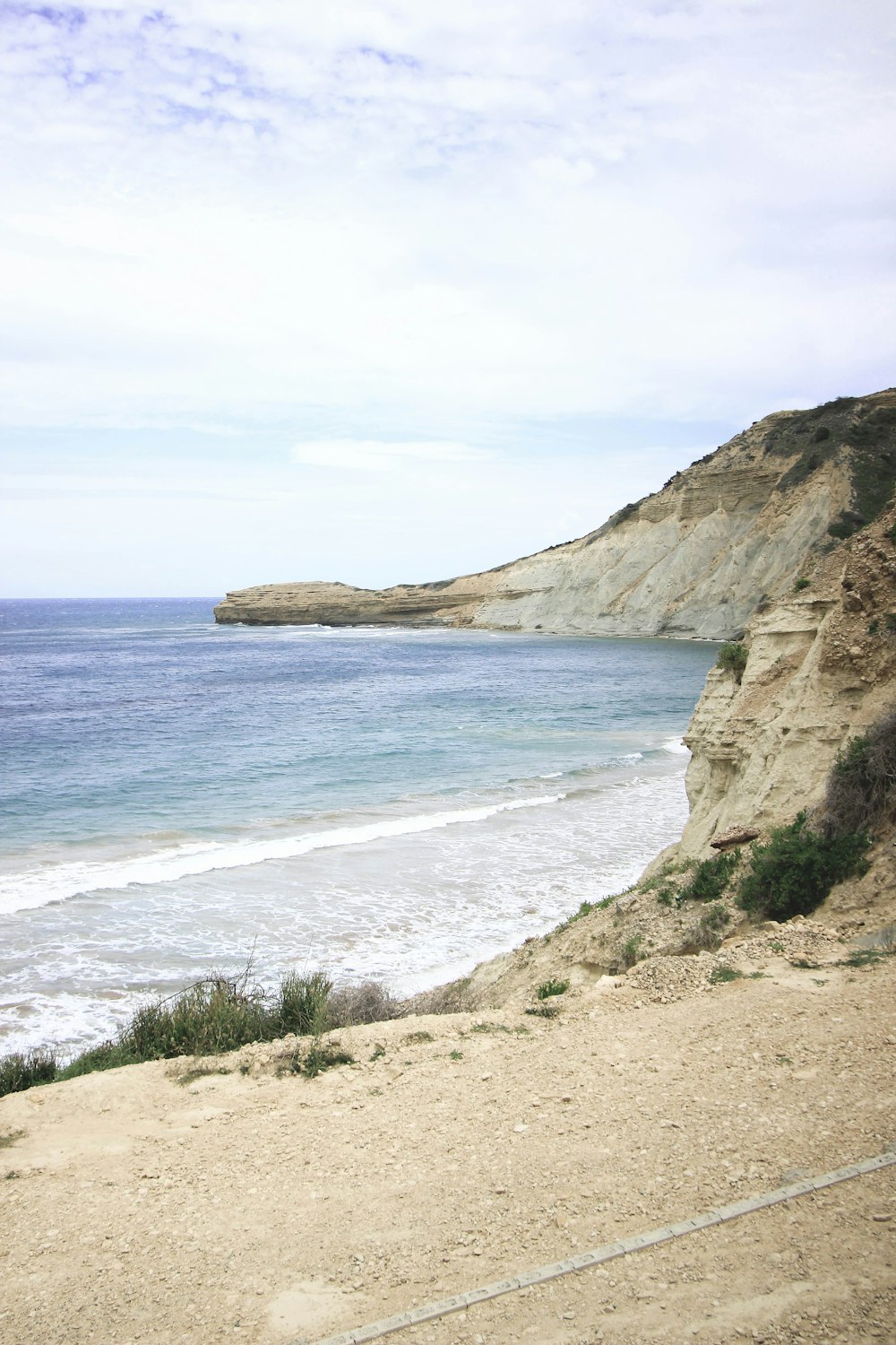 a view of the ocean from a cliff